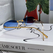 FIRST CRYSTAL RIMLESS OVAL FRAME SUNGLASSES 557152 IN METAL