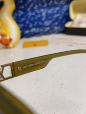 CAT EYE SUNGLASSES 567469 IN GREEN CLEAR ACETATE