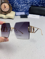 30MONTAIGNE S7U SUNGLASS 578109 IN GOLD METAL GREY SMOKE LENSES