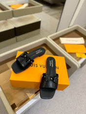 LV X TM 6AM FLAT MULE IN BLACK CALFSKIN