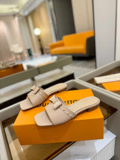 LV X TM 6AM FLAT MULE IN LINEN TAN CALFSKIN