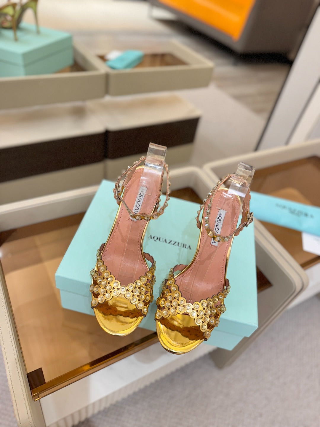 AQUAZZURA 26S STRAPPY HIGH HEELS 105 MM IN GOLD PATENT LAMBSKIN