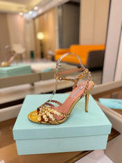 AQUAZZURA 26S STRAPPY HIGH HEELS 105 MM IN GOLD PATENT LAMBSKIN