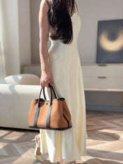 GARDEN PARTY 30CM IN ORANGE MINIMUM TOILETS COTTON CANVAS AND BLACK CALFSKIN