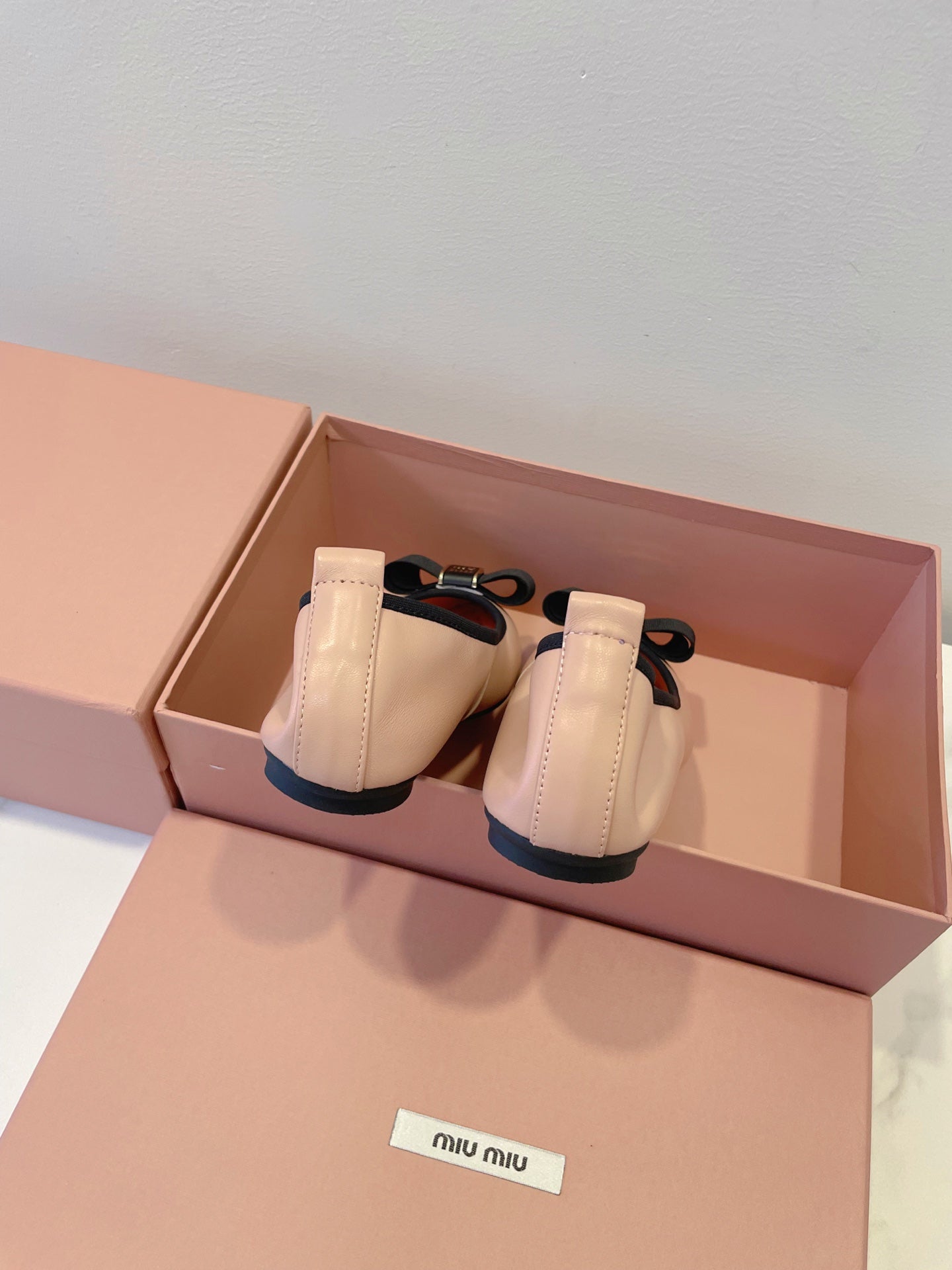 MIUMIU 26S BALLET FLATS IN LIGHT PINK CALFSKIN WITH BOW