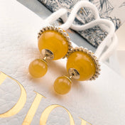 CD 26S YELLOW RESIN PEARL DOUBLE BALL EARRINGS IN GOLD METAL 631070
