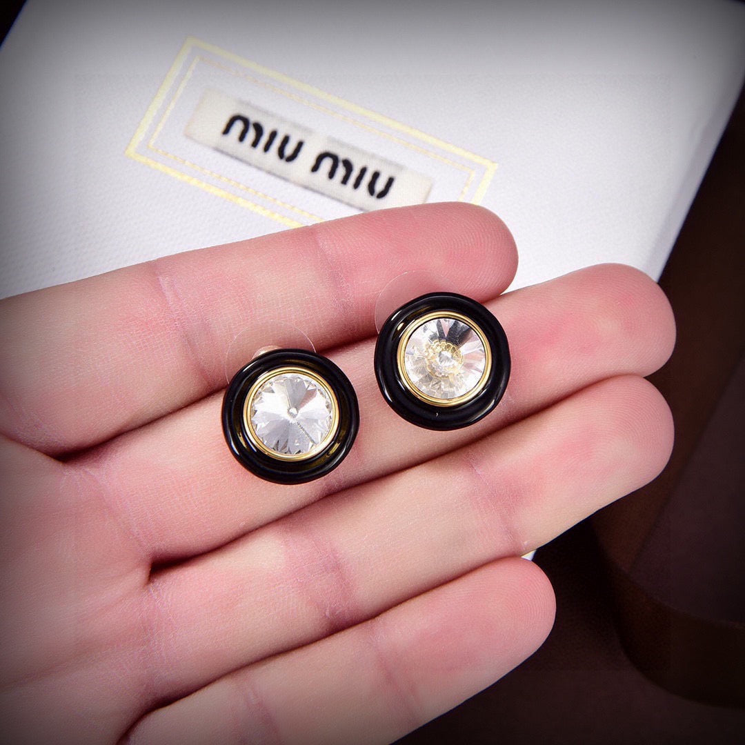 MIUMIU 26S ROUND CRYSTAL STUD EARRINGS IN BLACK RESIN AND GOLD TONE METAL 633262