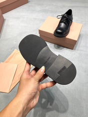 MIUMIU 26S LACE-UP LOAFERS IN BLACK SHINY CALFSKIN