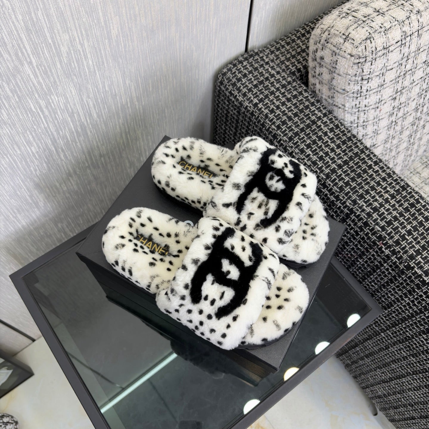 CHANEL 26S PLATFORM SLIDE SANDALS IN WHITE AND BLACK SHEARLING DALMATIAN PRINT