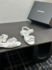 CHANEL 26S BOW SANDALS IN WHITE CALFSKIN