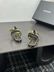 CHANEL 26S BOW SANDALS IN BLACK MIX GOLD SATIN
