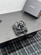 CHANEL 26S BOW SANDALS IN BLACK CALFSKIN