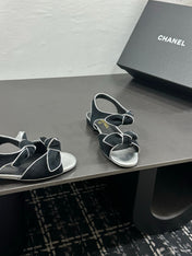 CHANEL 26S BOW SANDALS IN BLACK AND SILVER SUEDE