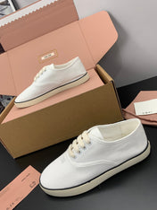 MIUMIU 26S LACE UP SNEAKERS IN WHITE CANVAS RUBBER SOLE
