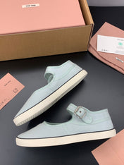 MIUMIU 26S MARY JANE FLATS IN PALE MINT CANVAS LOGO