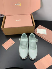 MIUMIU 26S MARY JANE FLATS IN PALE MINT CANVAS LOGO