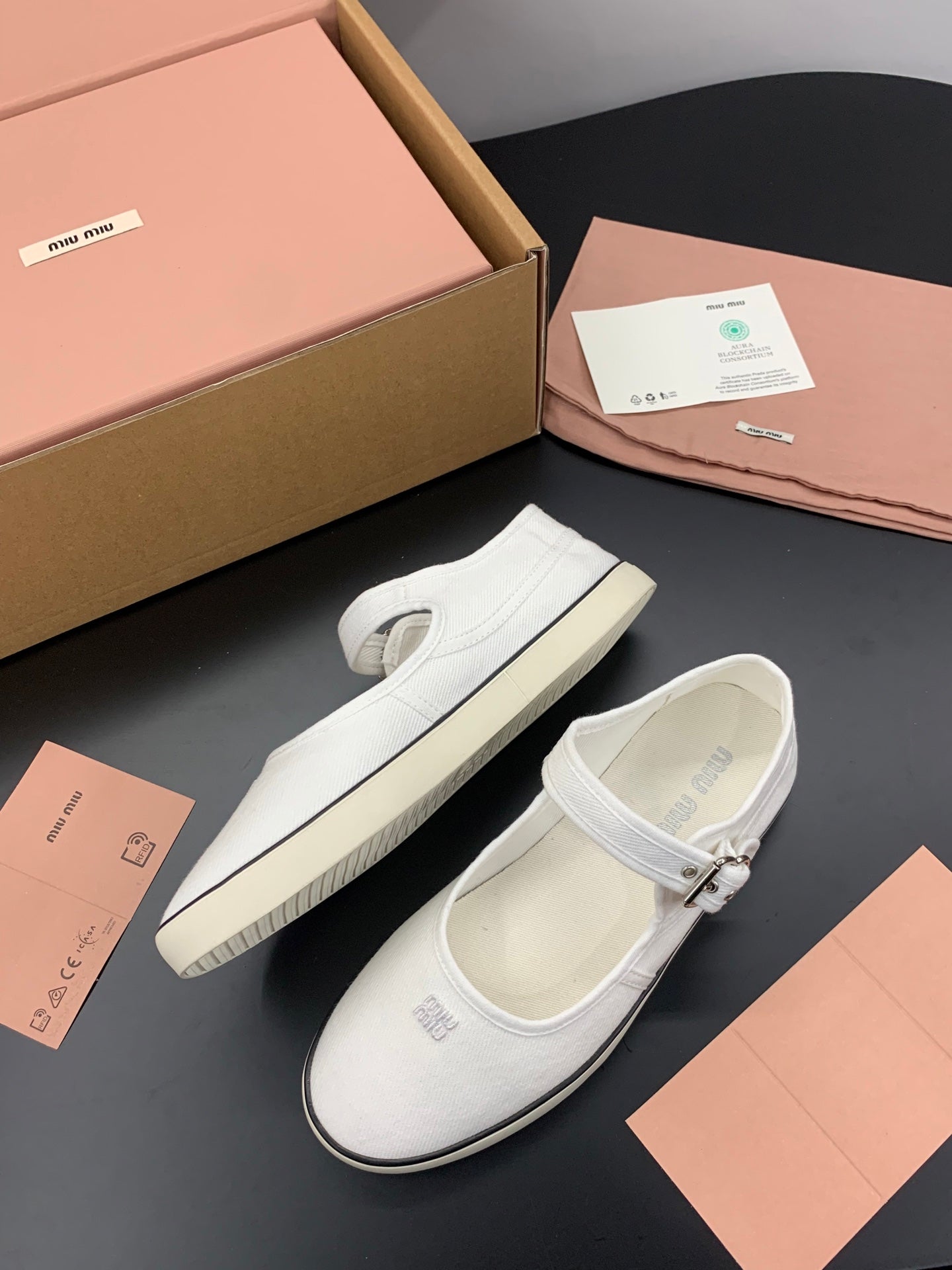 MIUMIU 26S MARY JANE FLATS IN WHITE CANVAS LOGO