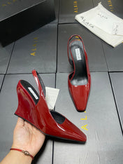 ALAIA 26S WEDGE SLINGBACKS 95 MM IN DARK RED PATENT CALFSKIN