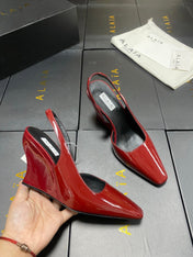 ALAIA 26S WEDGE SLINGBACKS 95 MM IN DARK RED PATENT CALFSKIN