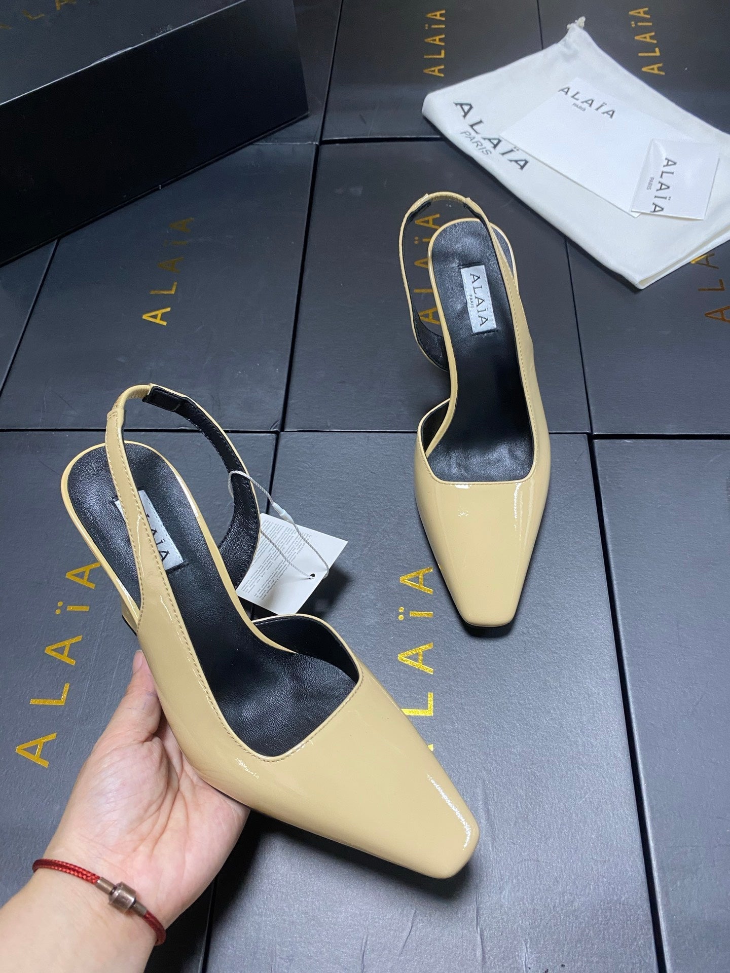 ALAIA 26S WEDGE SLINGBACKS 95 MM IN BEIGE PATENT CALFSKIN