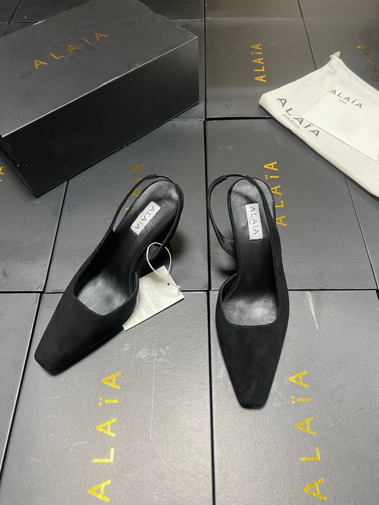ALAIA 26S WEDGE SLINGBACKS 95 MM IN BLACK SUEDE