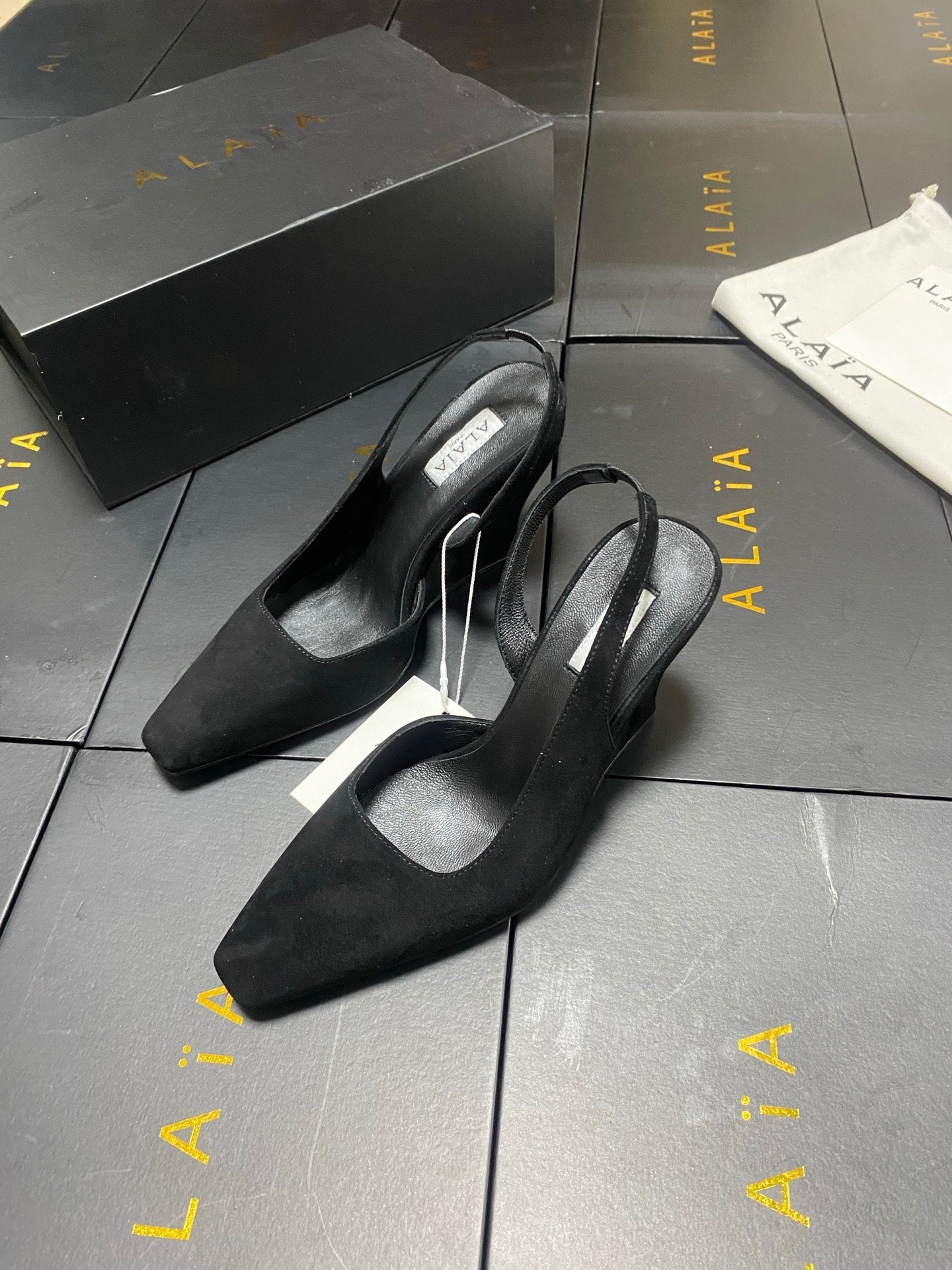 ALAIA 26S WEDGE SLINGBACKS 95 MM IN BLACK SUEDE