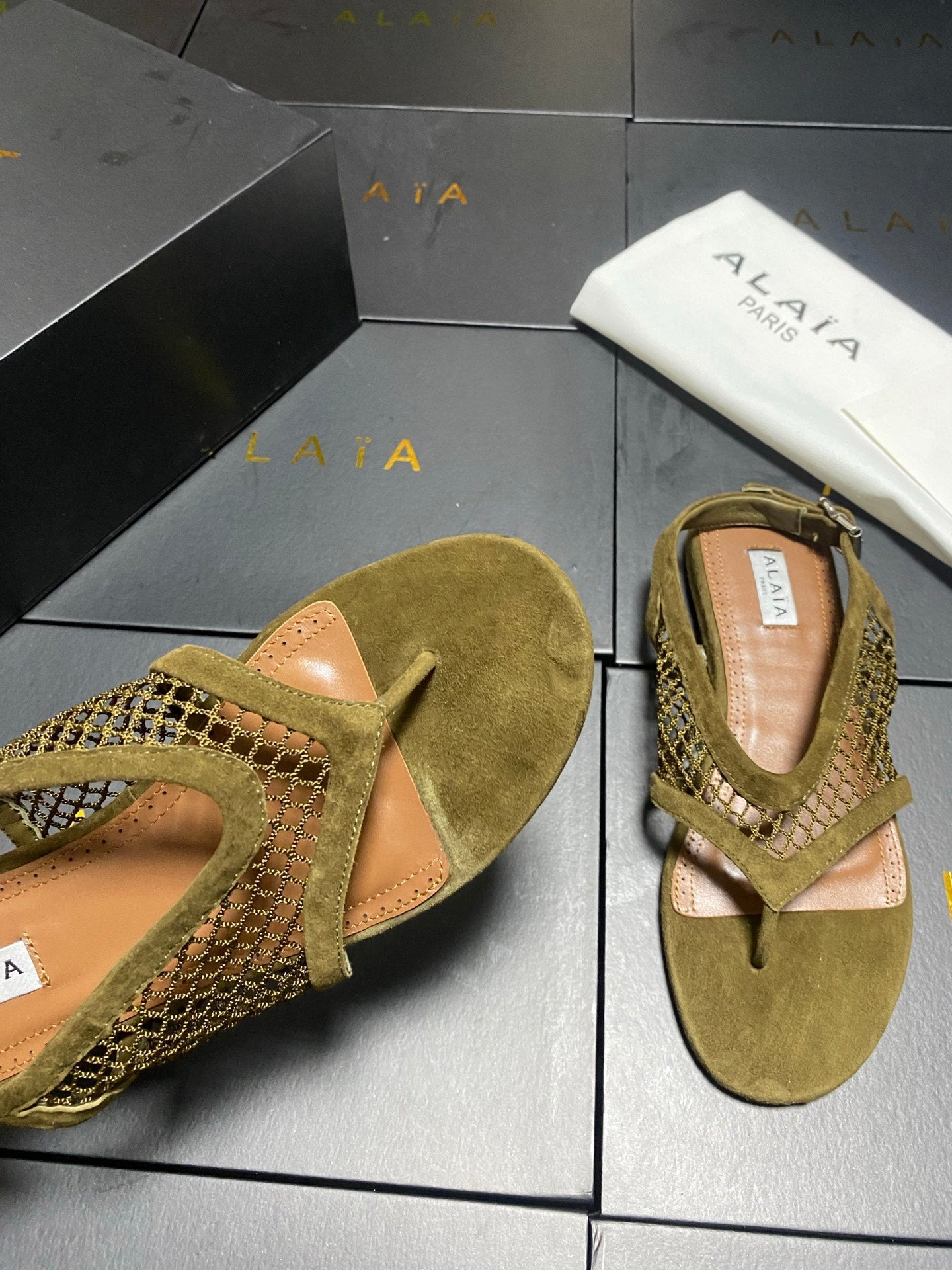 ALAIA 26S FLAT MESH THONG SANDALS MM IN MOSS GREEN SUEDE
