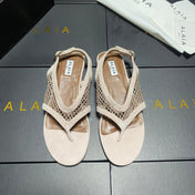 ALAIA 26S FLAT MESH THONG SANDALS IN BEIGE SUEDE