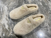 PRADA 26S SLIPPERS IN BEIGE WOOL
