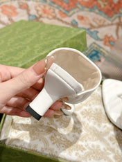HIGH THONG MULE 55MM IN WHITE CALFSKIN WITH GOLD HARDWARE