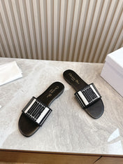 DIOR FLAT SLIDES 25S IN BLACK CALFSKIN AND FABRIC BRAND NAME EMBROIDERY