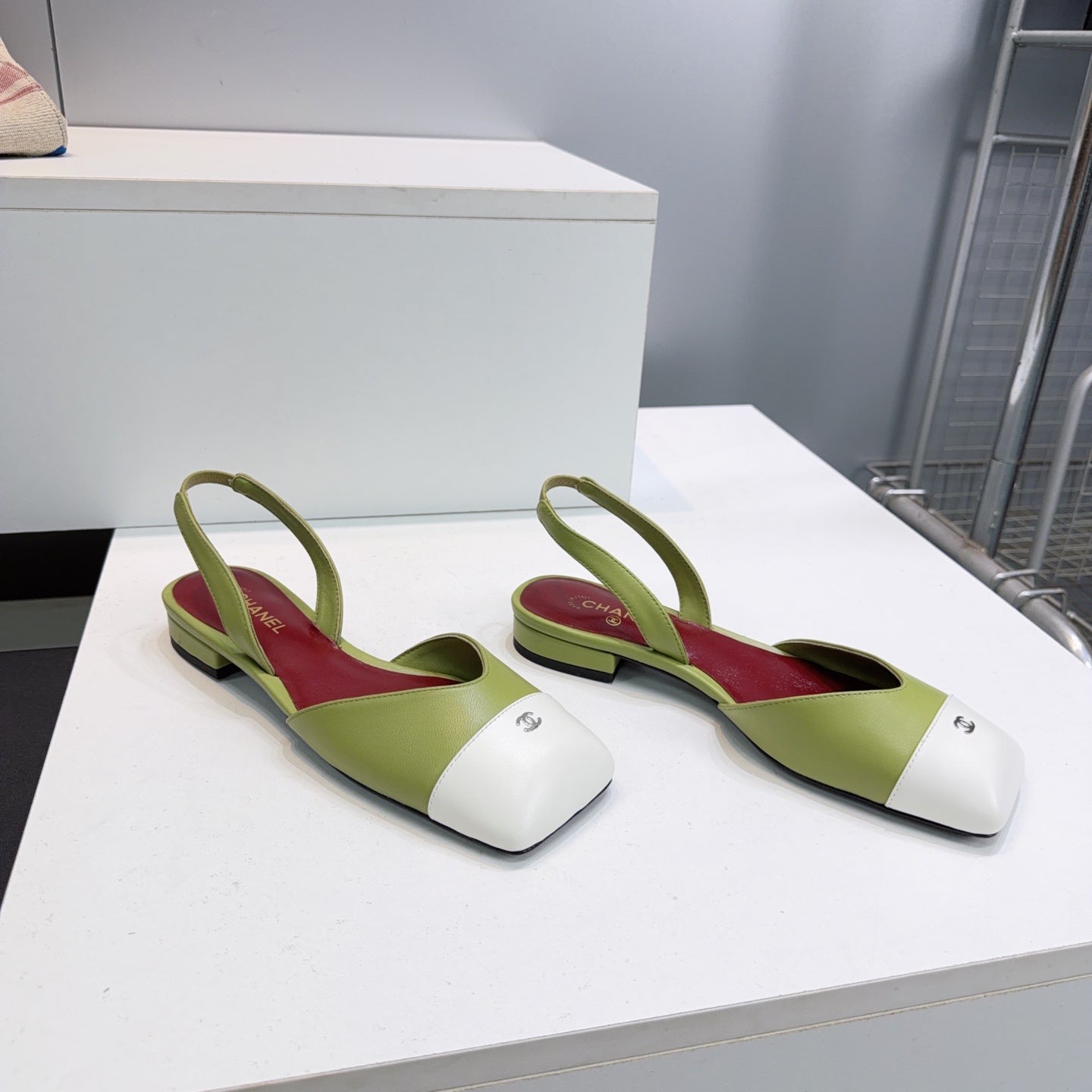 CHANEL 26S FLAT SLINGBACK IN GREEN LAMBSKIN WITH WHITE CAP TOE