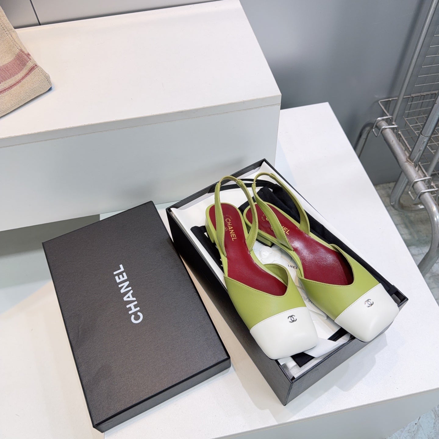 CHANEL 26S FLAT SLINGBACK IN GREEN LAMBSKIN WITH WHITE CAP TOE