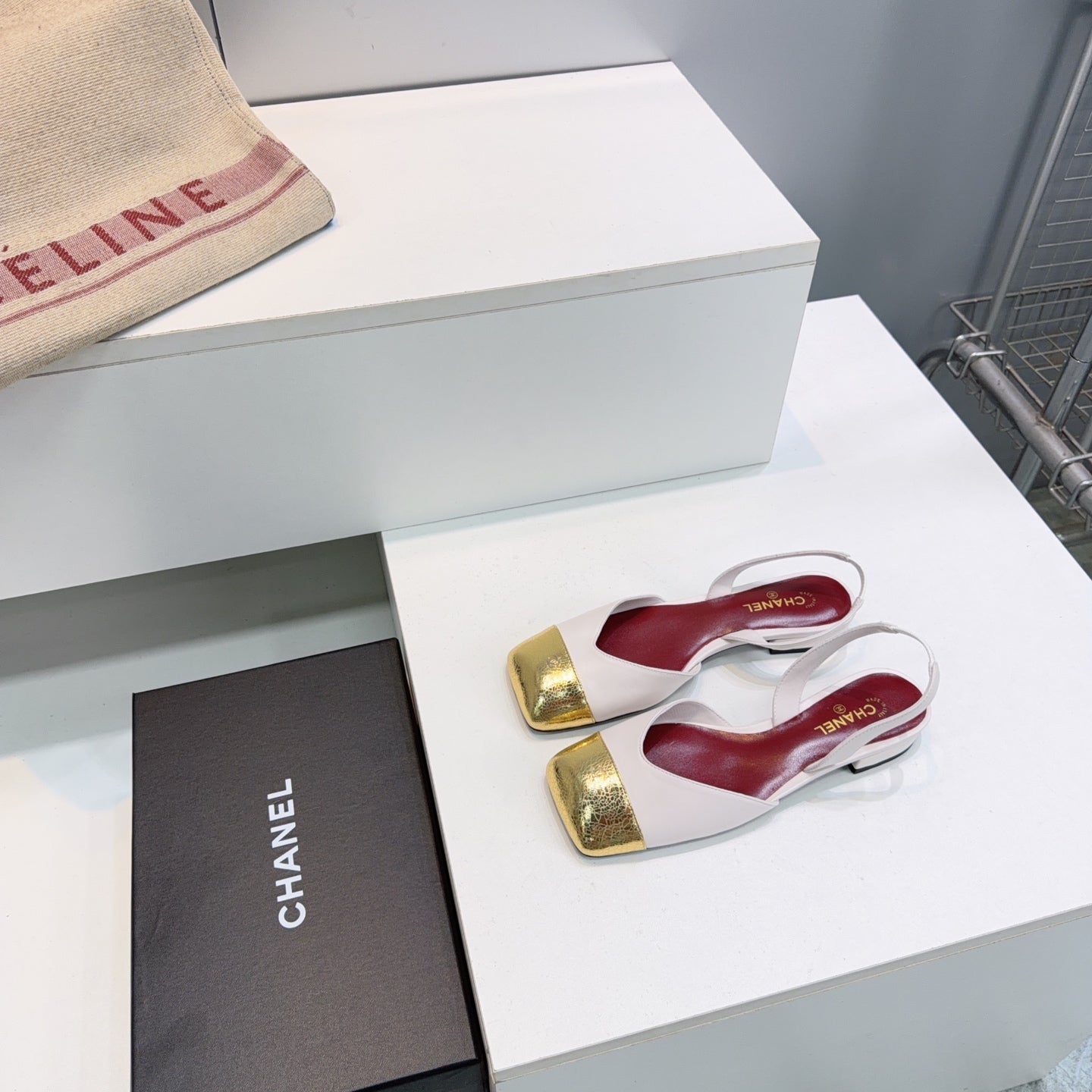 CHANEL 26S FLAT SLINGBACK IN WHITE LAMBSKIN WITH GOLD CAP TOE