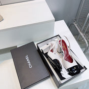 CHANEL 26S SLINGBACK 95 MM IN WHITE LAMBSKIN WITH BLACK CAP TOE