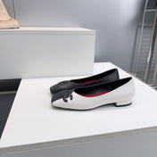 CHANEL 26S SQUARE-TOE FLATS IN BLACK AND WHITE LAMBSKIN
