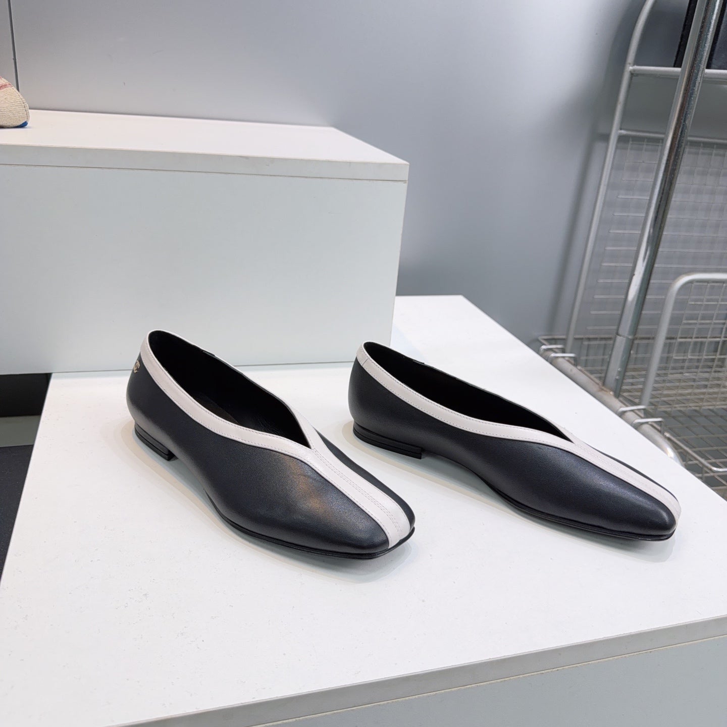 CHANEL 26S SQUARE-TOE FLATS IN BLACK LAMBSKIN WITH WHITE TRIM