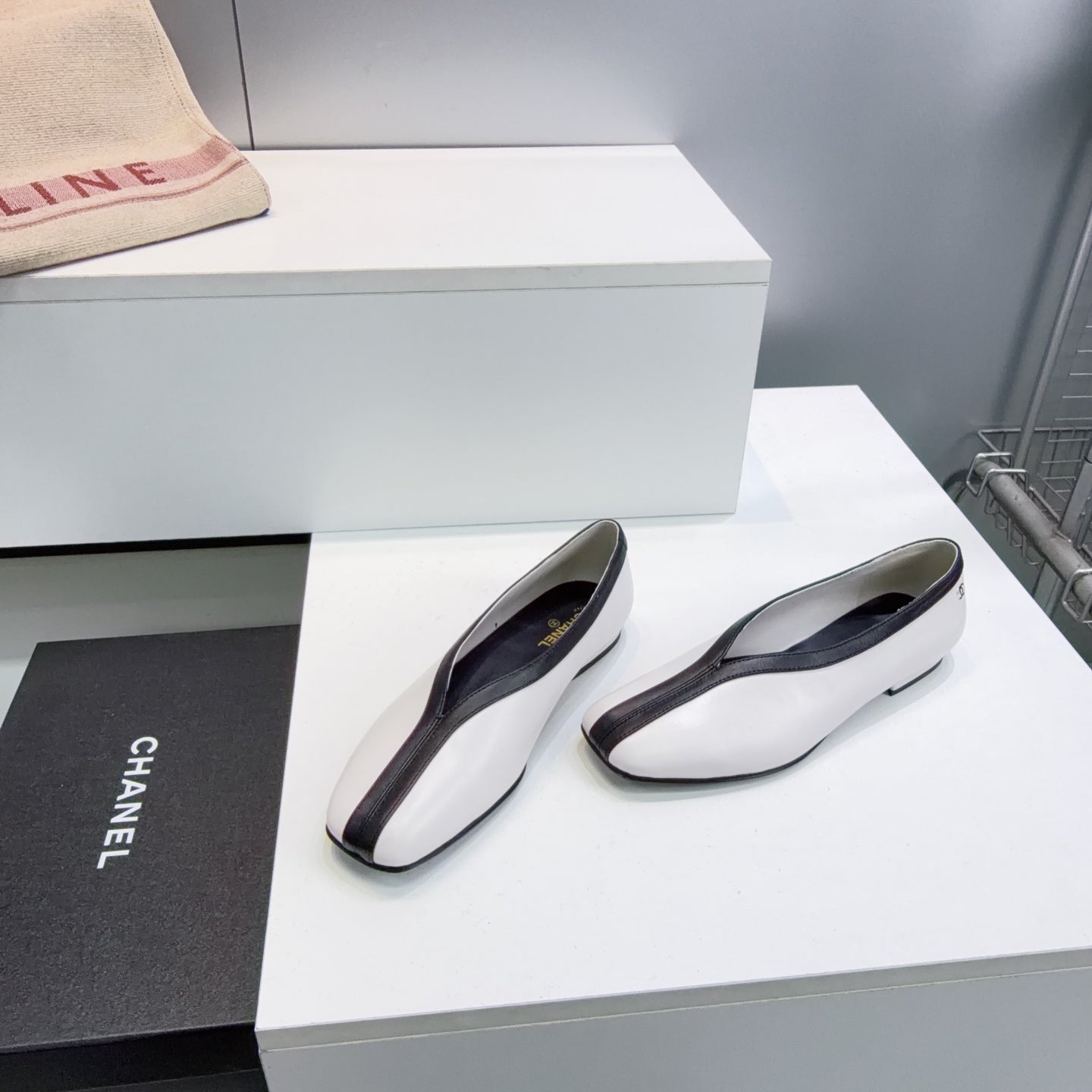 CHANEL 26S SQUARE-TOE FLATS IN WHITE LAMBSKIN WITH BLACK TRIM