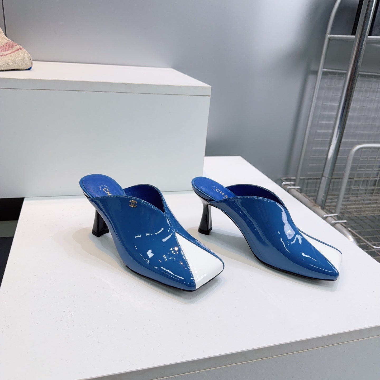 CHANEL 26S HIGH-HEEL MULES 70 MM IN BLUE AND WHITE LAMBSKIN