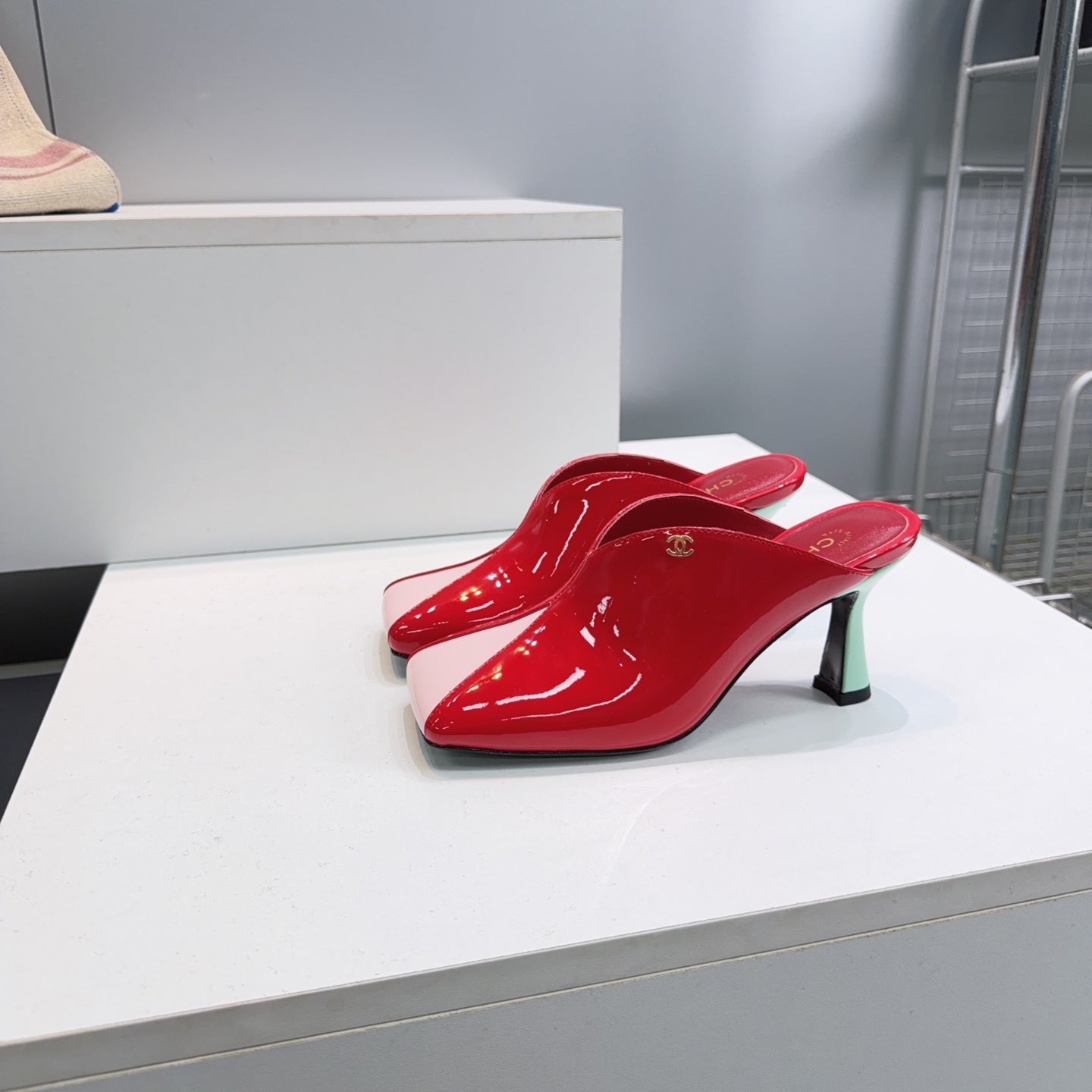 CHANEL 26S HIGH-HEEL MULES 70 MM IN PINK AND RED LAMBSKIN