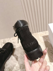CELINE 25S MARTIN BOOTS IN BLACK CALFSKIN