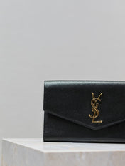 UPTOWN WALLET 21 IN BLACK CALFSKIN GOLD LOGO