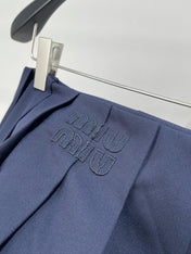 MIUMIU PLEATED LOW-BACK SIDE-SLIT MIDI SKIRT 275985