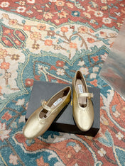 ALAIA MARY JANE IN GOLD LAMBSKIN WITH GOLD HARDWARE