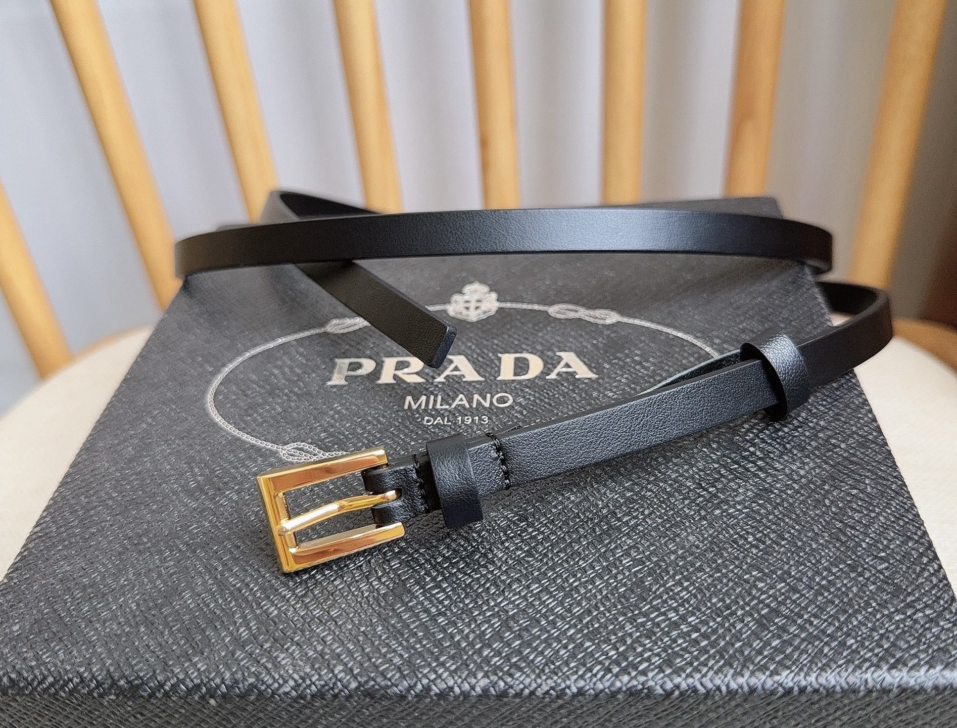 PRADA 25S BELT 10 MM IN BLACK CALFSKIN 598372