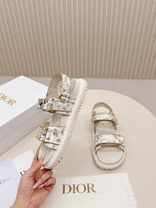 DIOR BACK-STRAP SANDALS 25S IN CREAM WHITE AND GOLD CALFSKIN WITH BUTTERFLY MOTIF