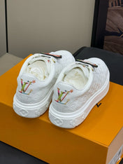 TIME OUT SNEAKER IN WHITE EMBOSSED MONOGRAM CALFSKIN