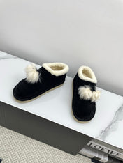 MIUMIU 26S ANKLE SHEARLING BOOTS IN BLACK SUEDE