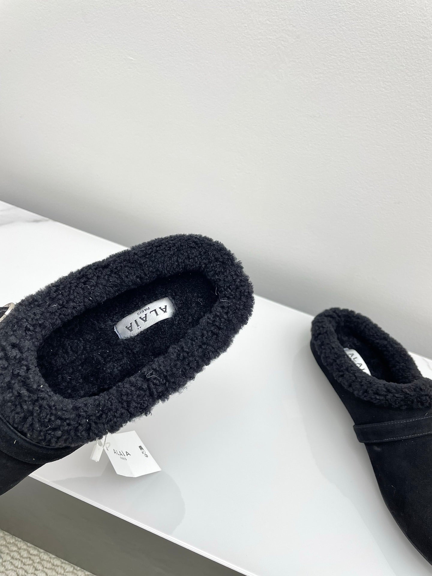 ALAIA 26S MULE IN BLACK SUEDE AND WOOL