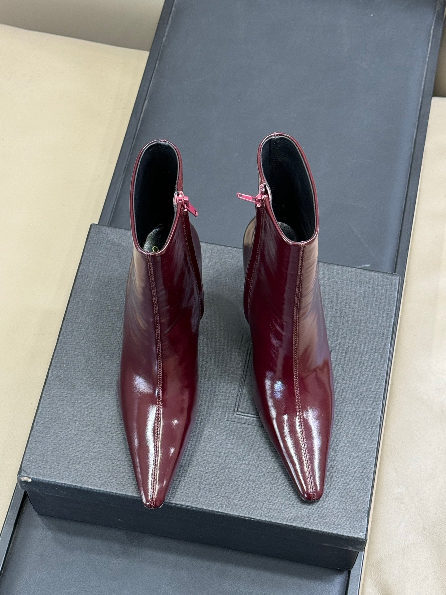 YSL 26S ZIPPERED HEELED BOOTS IN DARK RED SHINY CALFSKIN